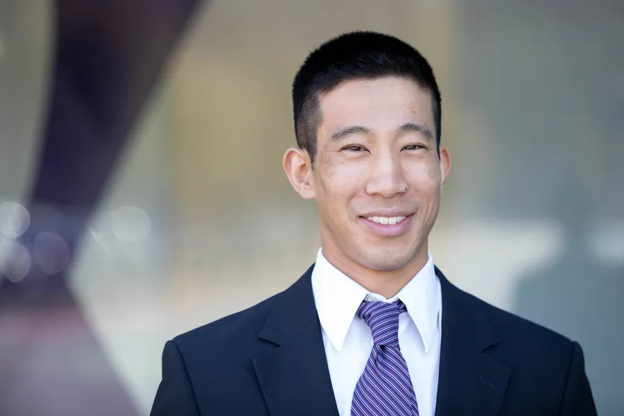 headshot of Nagata in suit